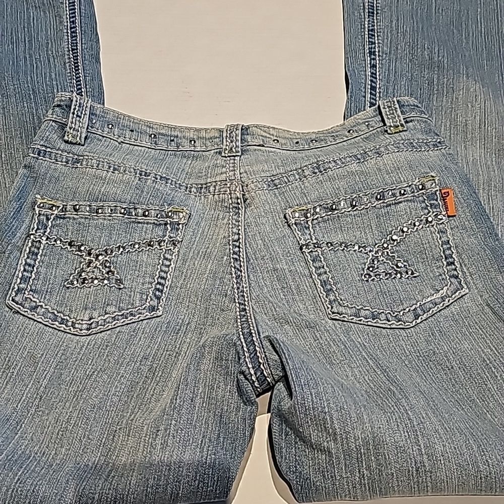 Flare legged embellished 5 pocket jeans by Daniel size 7-8